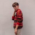 Pomarańczowy męski sweter z wełną z alpaki z Peru. Sweter unisex. Unikalne wzory, inspirowane peruwiańską kulturą, oraz komfortowy krój. Sweter dla niej i dla niego. Prawdziwa alpaka. Męski sweter Etno.